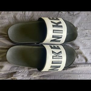 Nike Black & white Slides Size 13 Only worn in the house, like new!